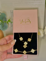 Load image into Gallery viewer, Gold Rhinestone Clover Stainless Steel Jewelry Set: Necklace, Earrings, Bracelet, Ring

