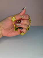 Load image into Gallery viewer, Brown &amp; Gold Clover Jewelry Set: Necklace, Earrings, and Bracelet
