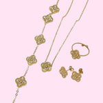 Load image into Gallery viewer, Gold Rhinestone Clover Stainless Steel Jewelry Set: Necklace, Earrings, Bracelet, Ring
