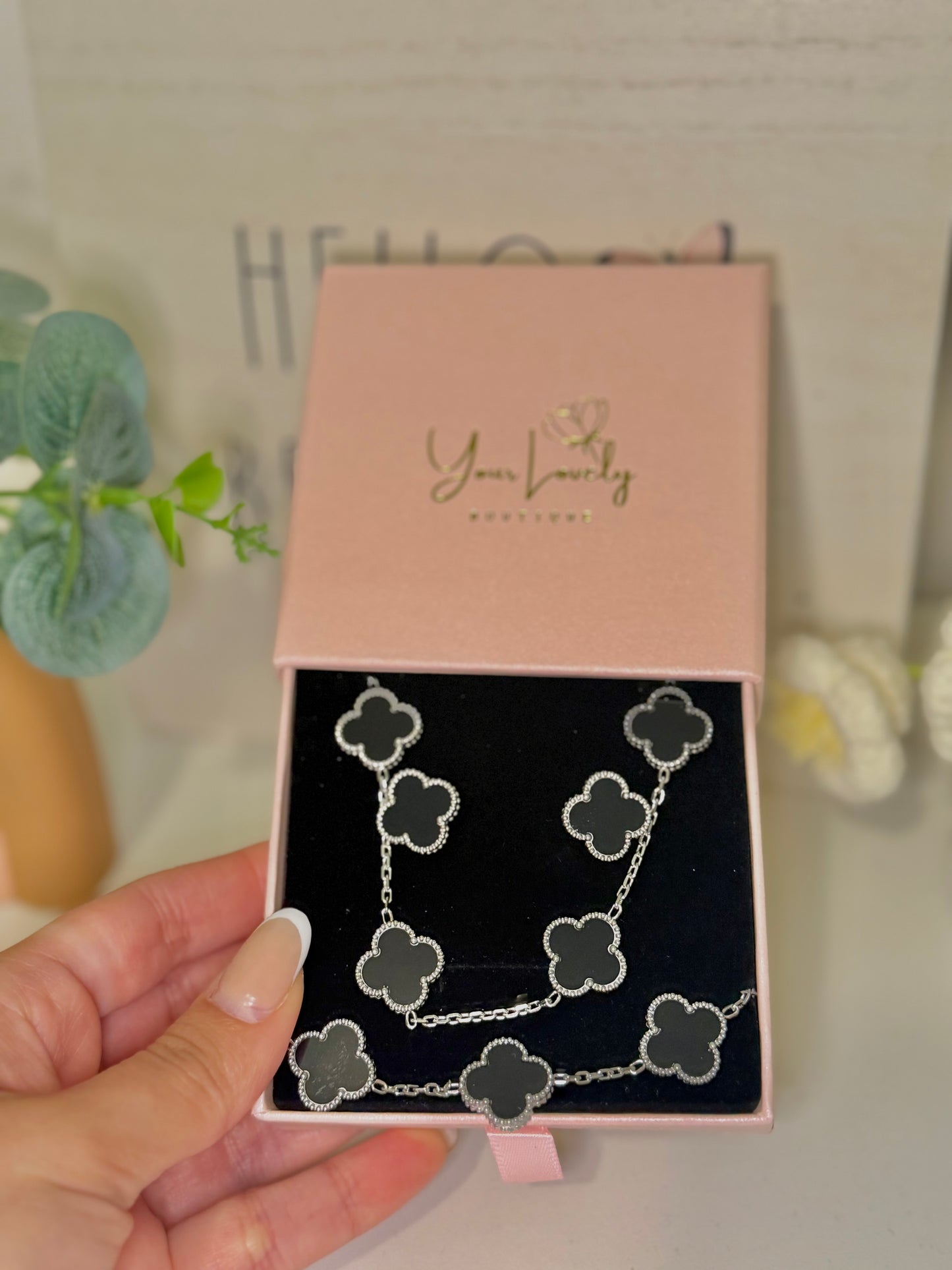 Black and Silver Clover Jewelry Set: Necklace, Earrings, and Bracelet