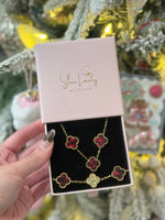 Load image into Gallery viewer, Red &amp; Gold Clover Stainless Steel Jewelry Set: Necklace, Earrings, Bracelet
