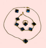 Load image into Gallery viewer, Blue Clover Stainless Steel Jewelry Set: Necklace, Earrings, Bracelet, Ring

