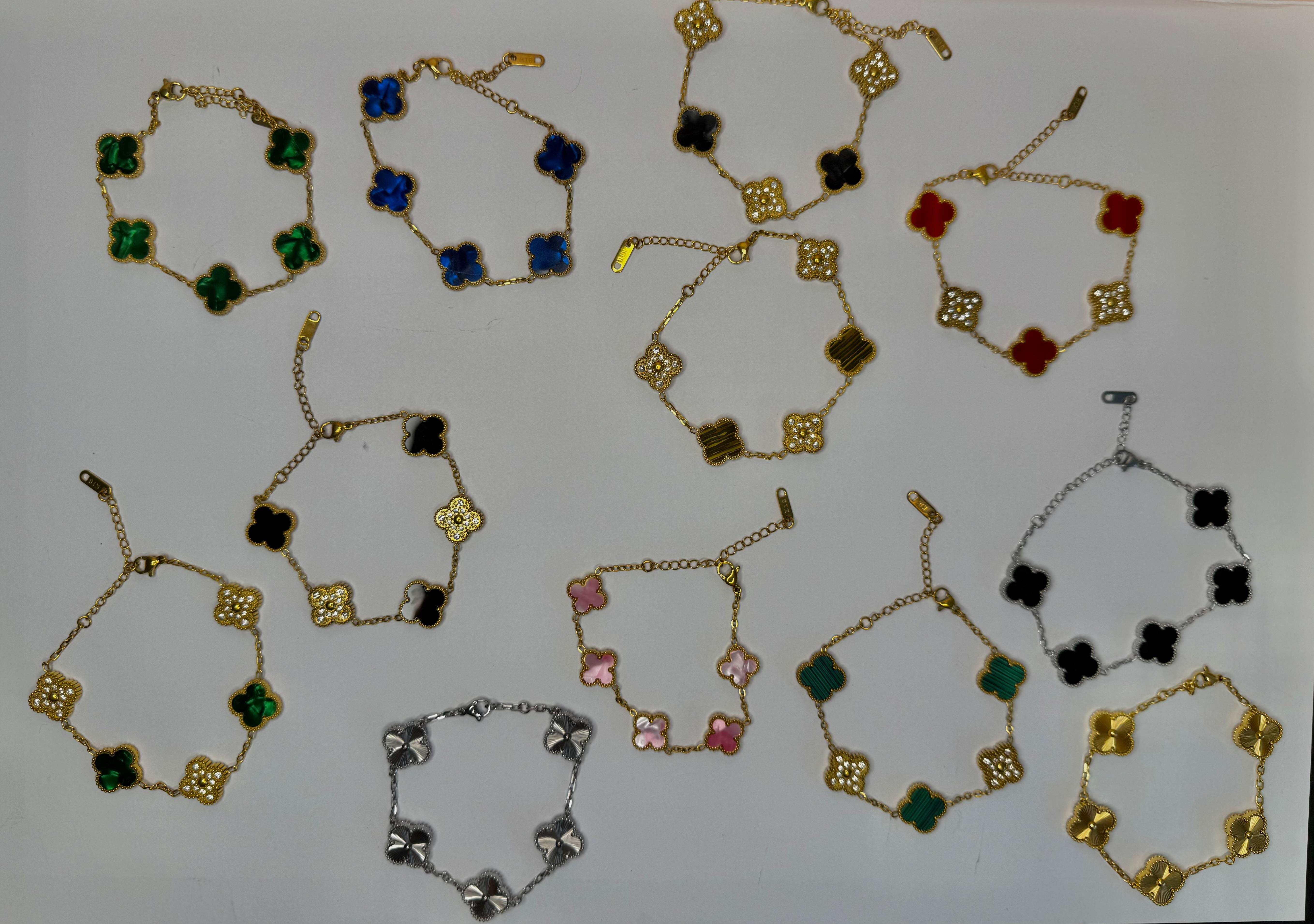 Gold Clover Stainless Steel Bracelets: Green, Red, White, and Black