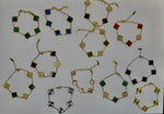 Load image into Gallery viewer, Gold Clover Stainless Steel Bracelets: Green, Red, White, and Black
