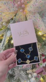Load and play video in Gallery viewer, Blue &amp; Gold Clover Stainless Steel Jewelry Set: Necklace, Earrings, Bracelet
