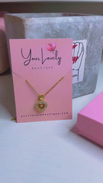 Load and play video in Gallery viewer, Golden Heart Necklace
