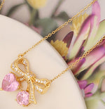 Load image into Gallery viewer, Pink Coral Bow Necklace
